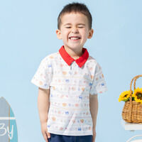 お顔総柄半袖ポロシャツ